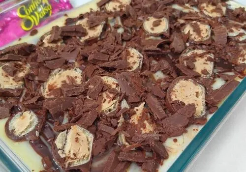 Pavê de Sonho de Valsa, Receita de Sobremesa, Doce com Sonho de Valsa, Sobremesa de Chocolate, Receita Fácil de Pavê, Delícia de Chocolates, Sobremesa Gelada, Receita de Sobremesa com Bombons, Pavê Simples e Delicioso, Chocolate e Sonho de Valsa, Passo a Passo de Pavê, Sobremesa para Festas, Receita de Pavê de Chocolate, Sobremesa Irresistível, Sobremesa de Chocolate com Biscoito.
